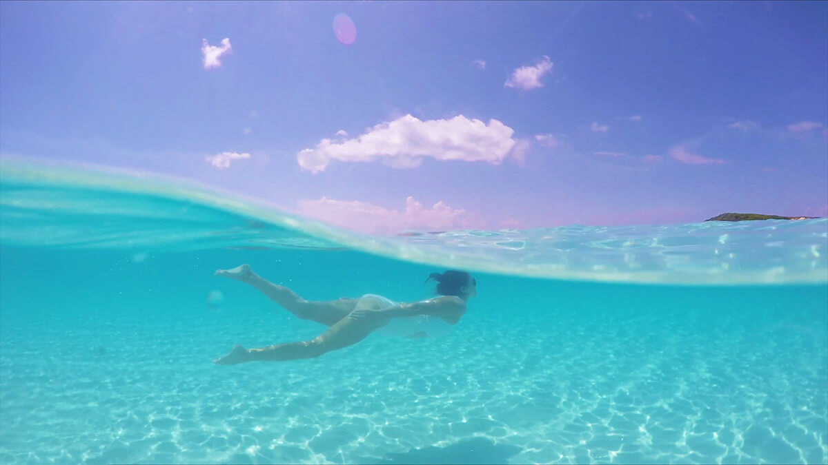 Tropic of Cancer Beach Over Under GoPro Swimming Pelican Beach
