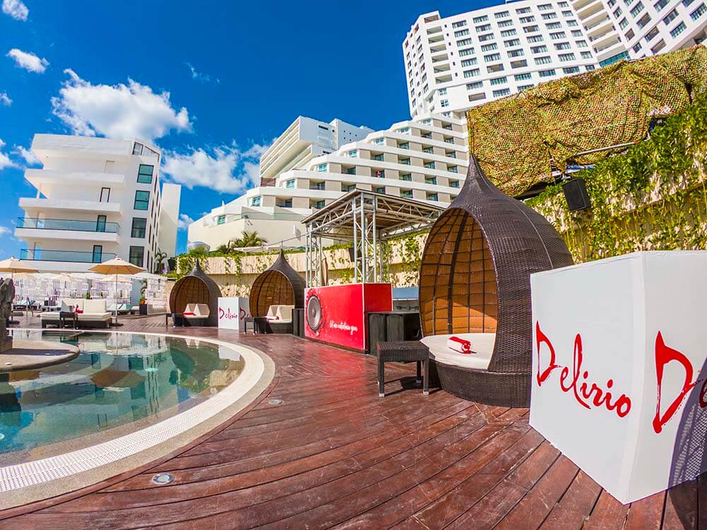 melody maker cancun review The Delirio Day Club Beach Club bottle service |  Vacation Couple